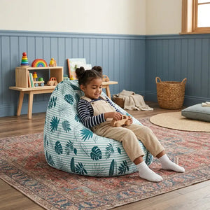 Medium Patterns kids bean bag in Leaves print: girl playing with a wooden toy car - Magalis Egypt
