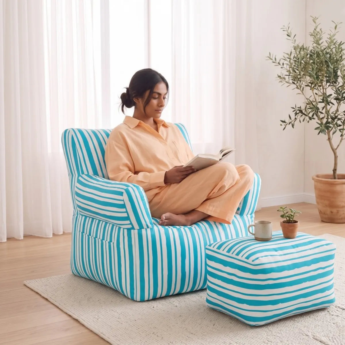 Royal Chair Aqua Flare: woman in peach linen reading - Magalis Egypt
