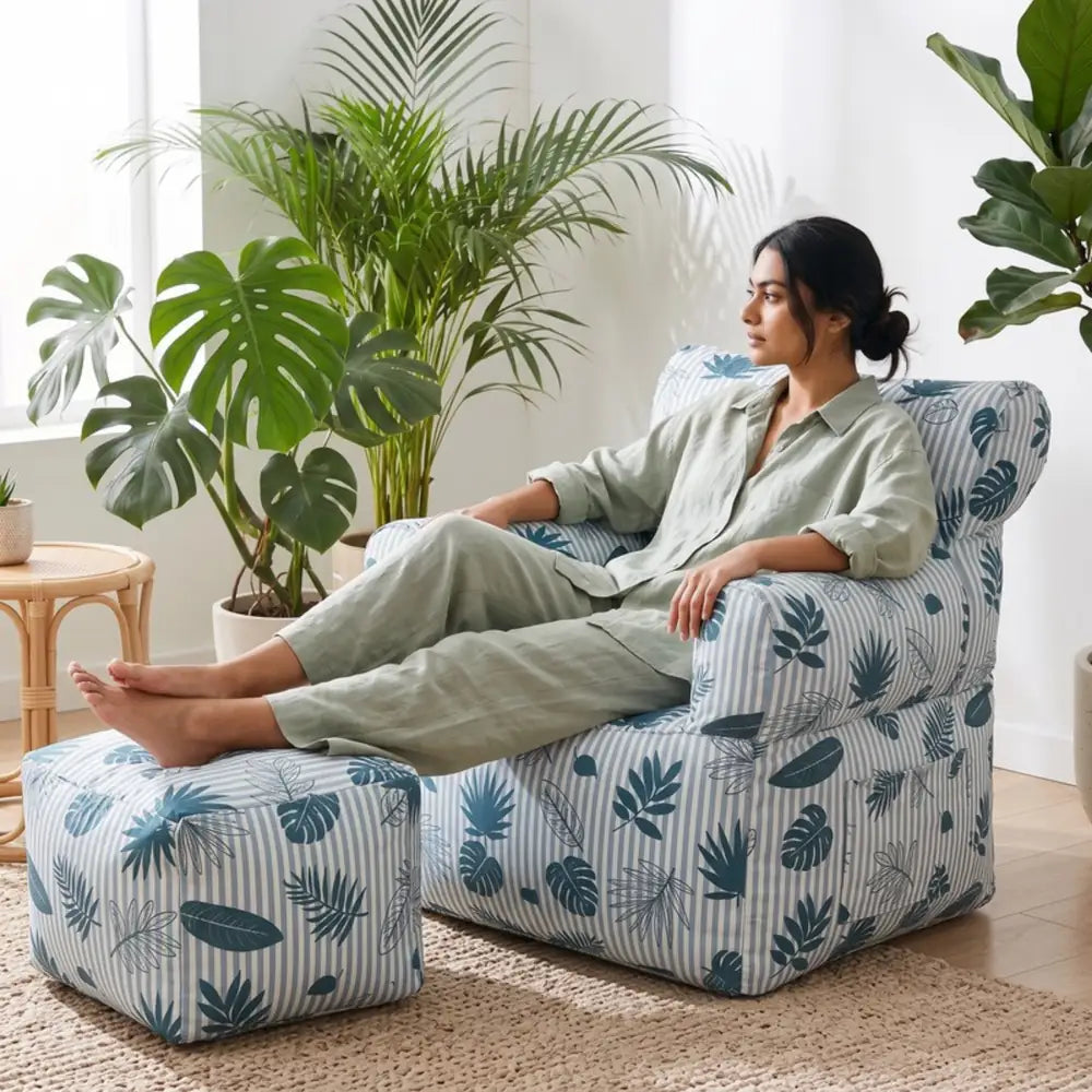 Royal Chair Leaves: woman in sage linen with legs on the footstool - Magalis Egypt