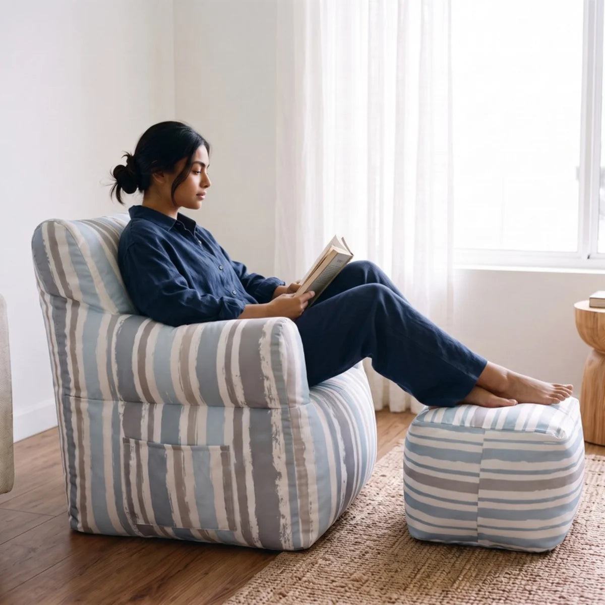 Royal Chair Waves: woman in navy linen reading - Magalis Egypt